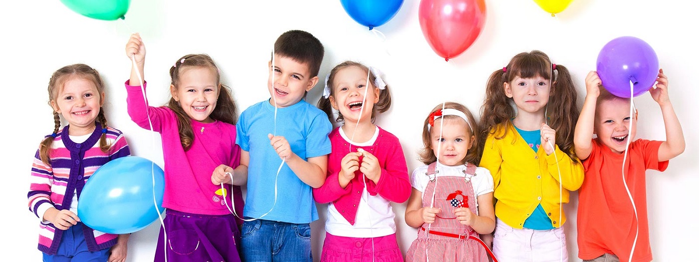 Happy children with colorful balloons